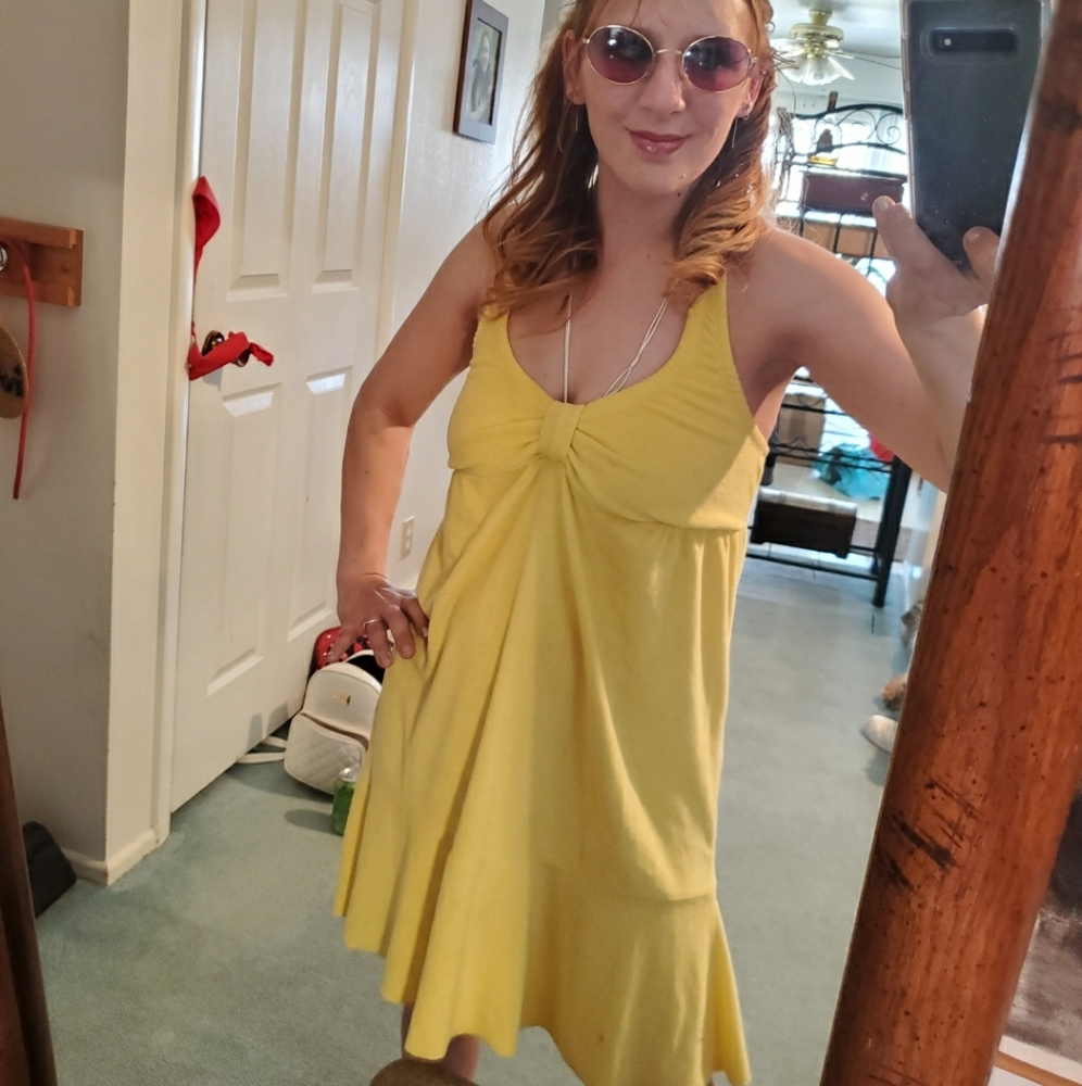 a yellow swimsuit cover halter dress,